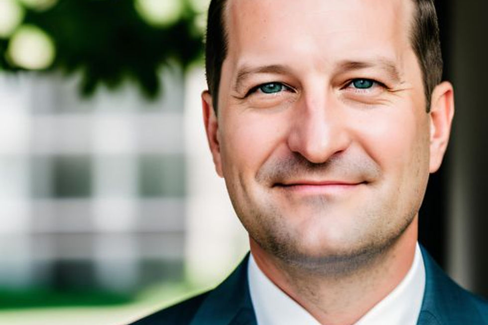 Man in a suit smiling