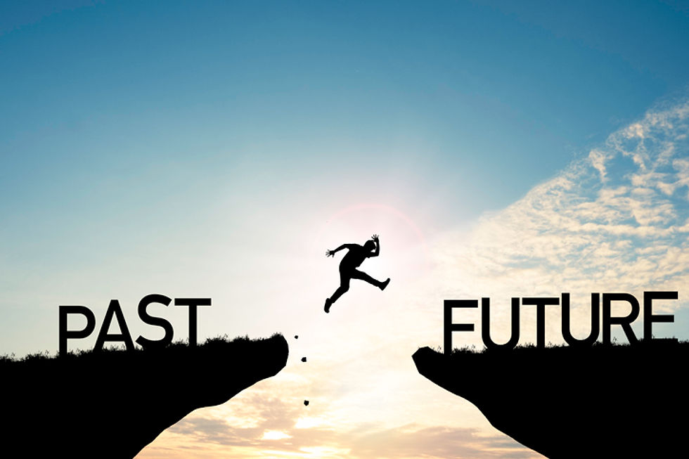Person jumping from PAST to FUTURE cliffs