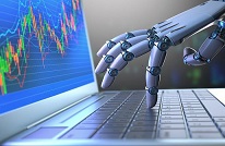 Robotic hand using a laptop with trading charts.