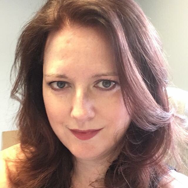 Professional headshot of a female team member