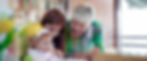 Grandmother, mother, and baby looking together.