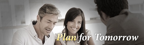 A couple smiling during a meeting with a professional advisor with the text Plan for Tomorrow