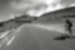 Cyclist on a winding mountain road