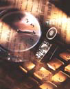 Clock face overlaid on a phone and computer keyboard