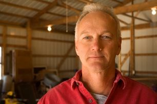 A business owner standing in his workshop