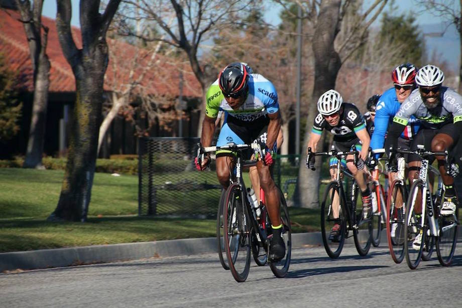 Cycling group in a community race on a sunny road