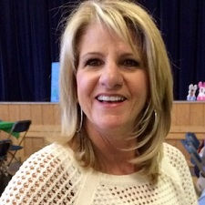 Portrait of Debbie Metrokas smiling