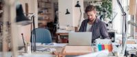 Small business owner on business planning with financial advisor