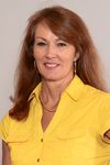 Professional notary service provider in a yellow shirt