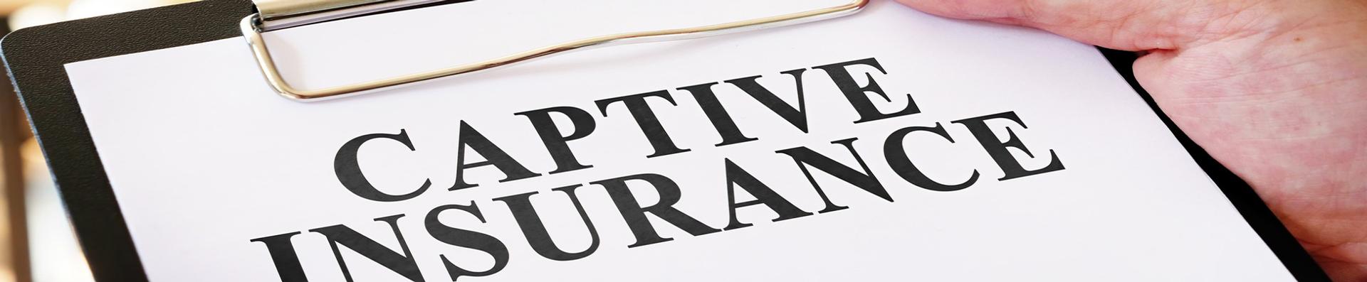 captive insurance on clipboard