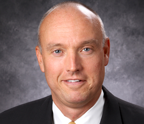 Professional headshot of a male advisor