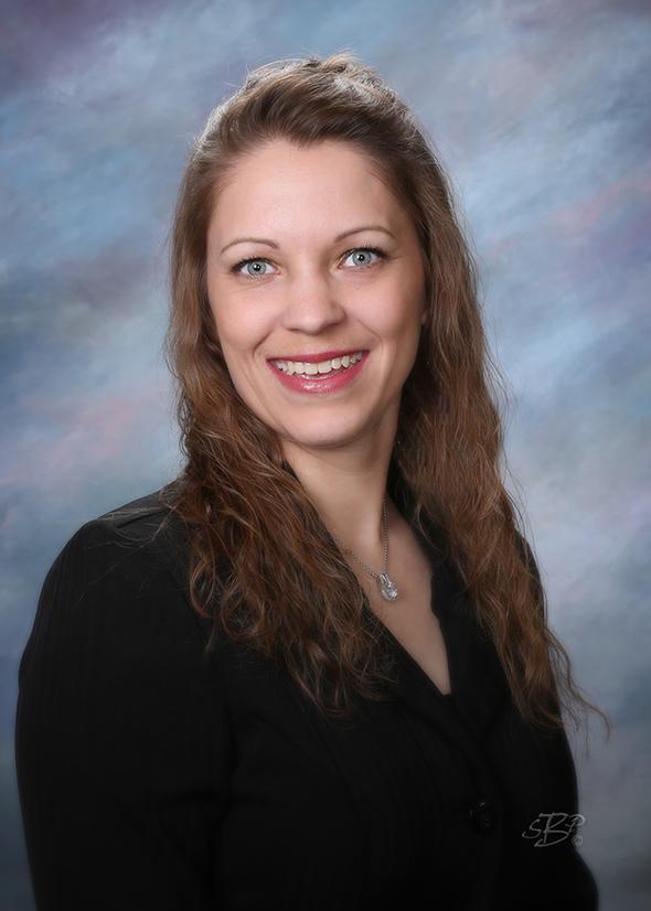 Smiling female member of the TCB Insurance Team.