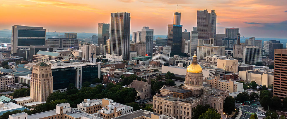 City skyline with golden dome at sunset