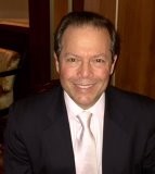 Smiling man in a suit and tie