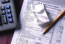 U.S. Corporation Income Tax Return form with a calculator