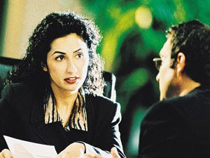 Woman consulting a man about benefit plans