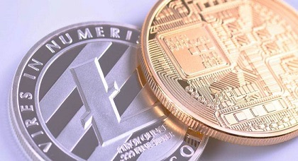 Gold Bitcoin and silver Litecoin digital currency coins.