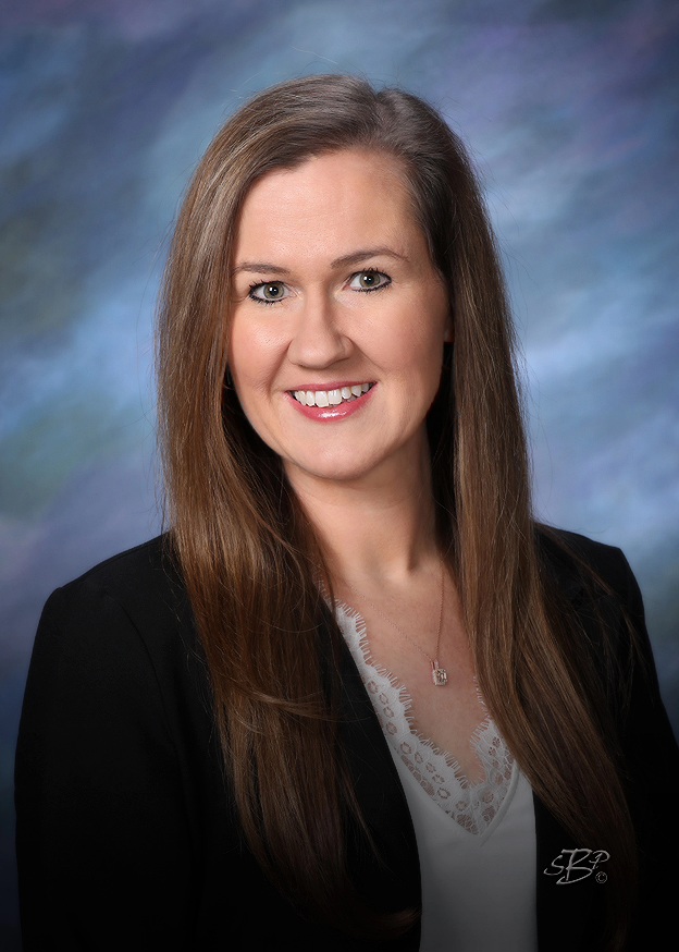 Portrait of a smiling female TCB Insurance Team member