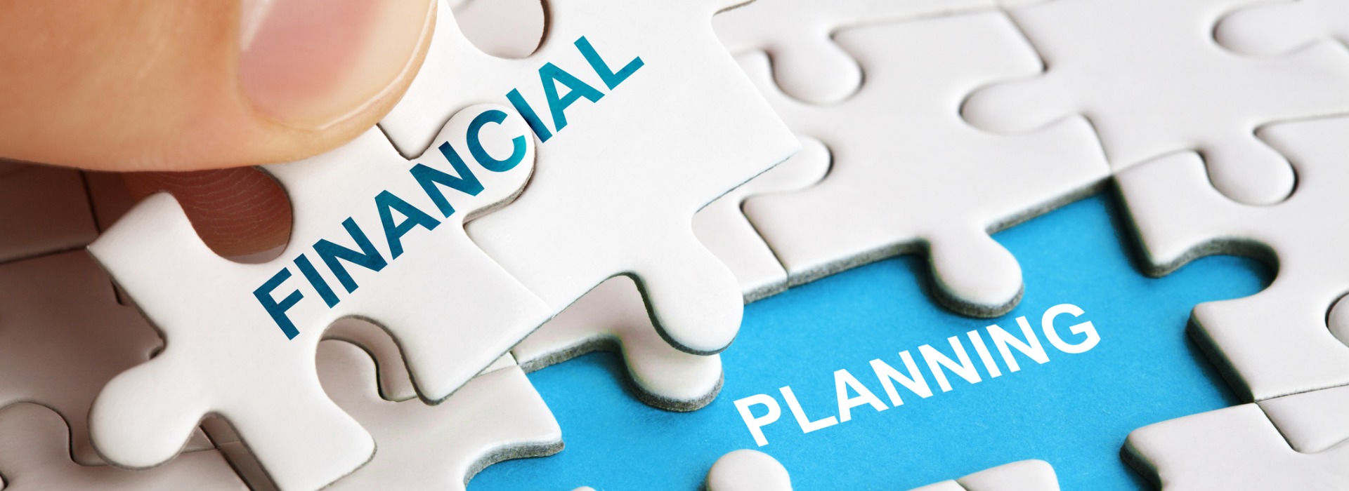 Puzzle pieces forming the words Financial Planning