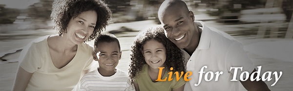 Happy family of four with text Live for Today