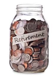 Glass jar full of coins with a Retirement label.