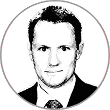 Professional headshot of a man for About US page