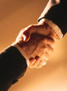 Close-up of a professional handshake representing a business agreement.