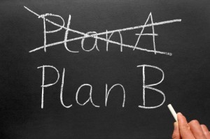 Plan A crossed out with Plan B written on a chalkboard