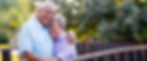 Happy older couple embracing outdoors