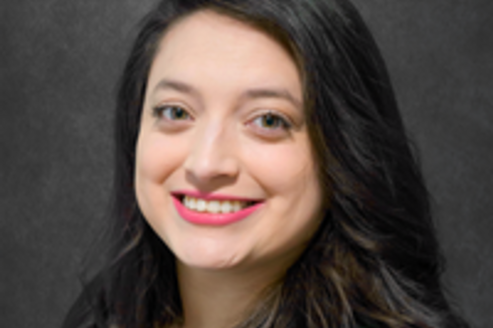 Smiling woman with dark hair