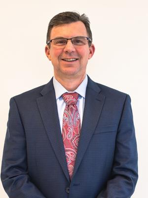 Chad J. Bughi, LUTCF