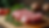Close-up view of fresh pork chops on a wooden cutting board