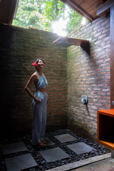 KittyUnofficial in an outdoor shower