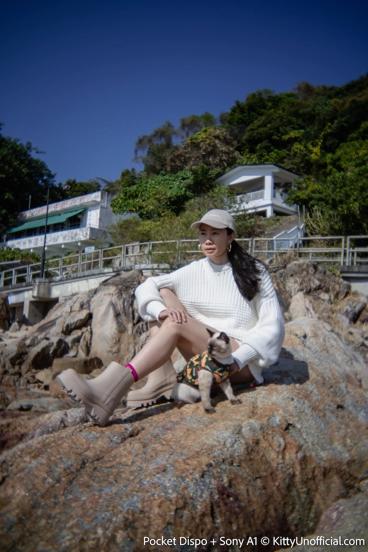 Kitty Unofficial with her cat sat on a rock