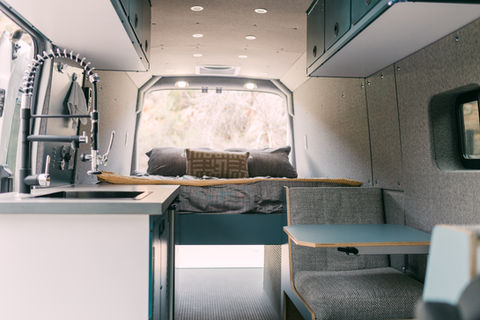 Explore Utah in comfort with this transit campervan, featuring a queen-sized bed, kitchenette, and ample storage for your adv