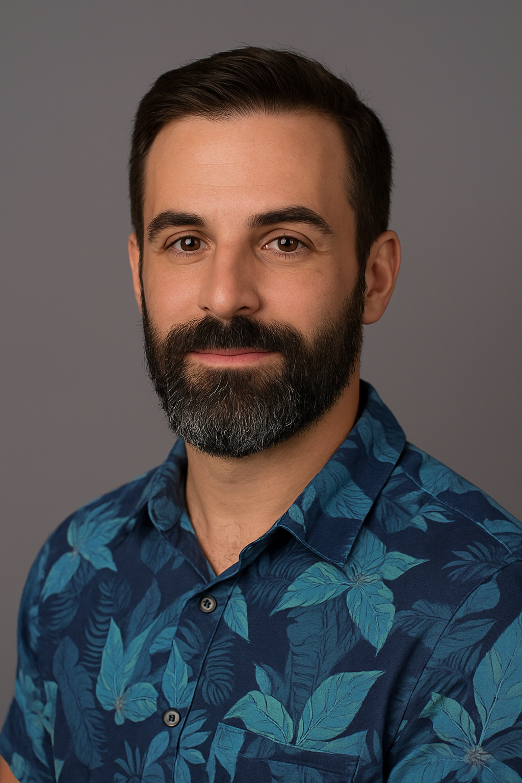 Stylish Headshot with Tropical Shirt.png