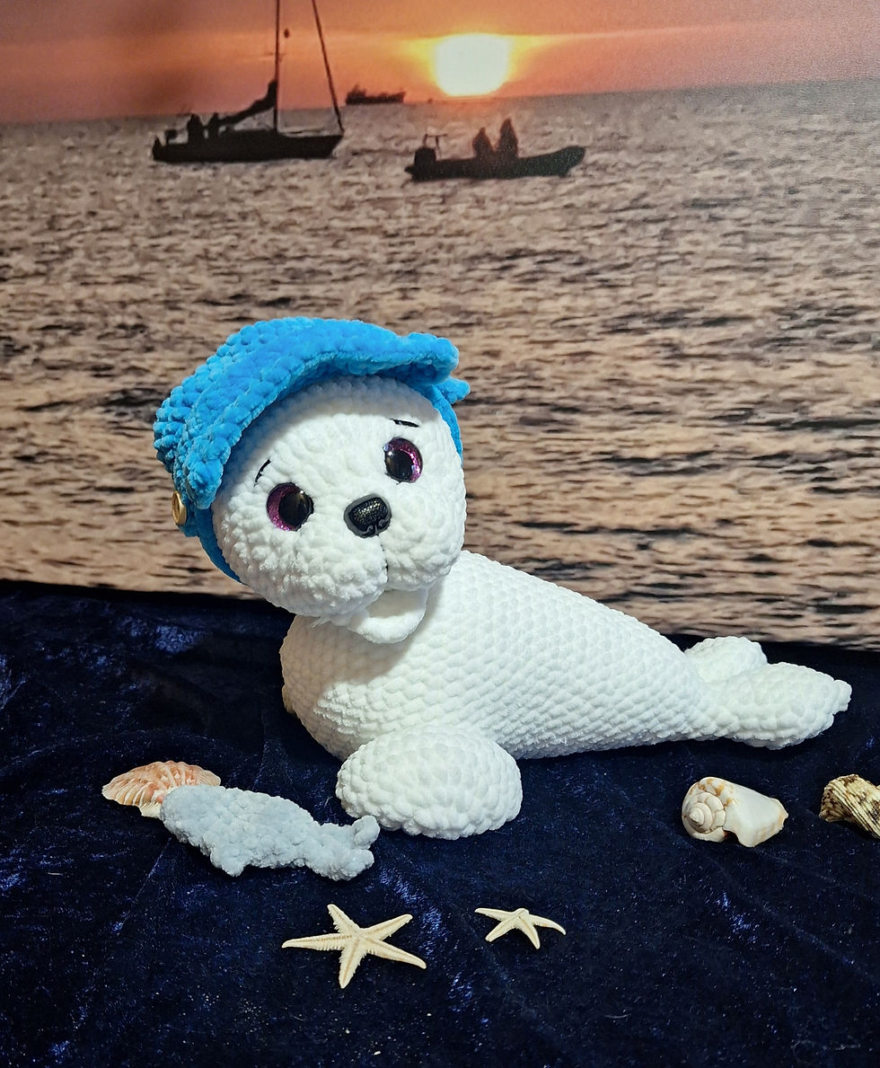 Miniaturbild: Niedlicher Amigurumi-Seehund mit Mütze