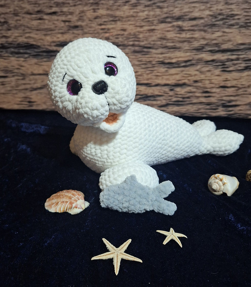 Miniaturbild: Niedlicher weißer Robben-Amigurumi