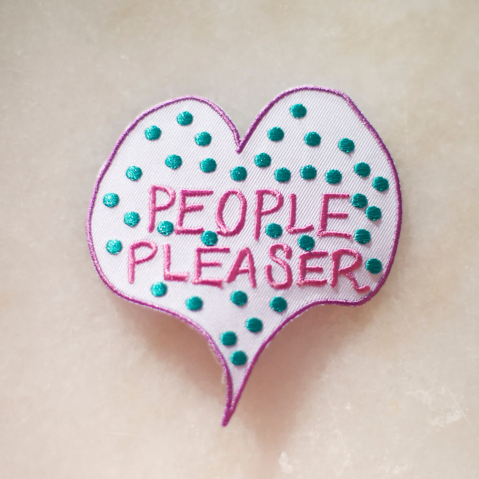 Embroidered badge with the words 'people pleaser'