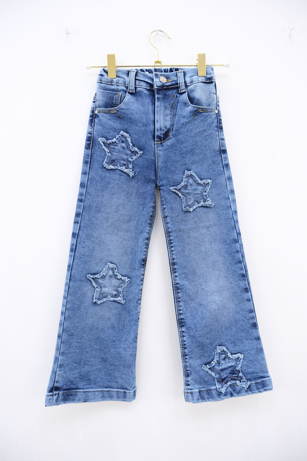 Jeans claros con estrellas de mezclilla corte wide leg para niña marca Bridel