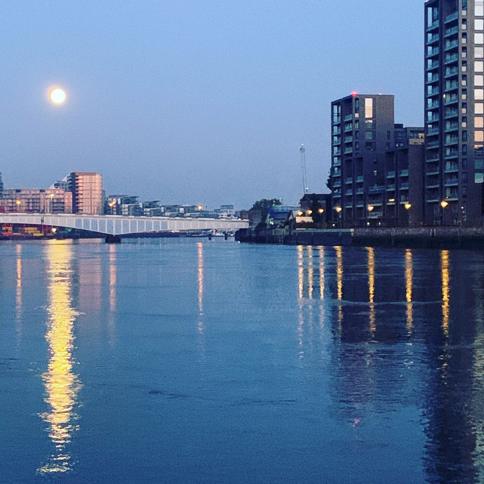 A brilliant full moon over the Thames. battersea london hotel