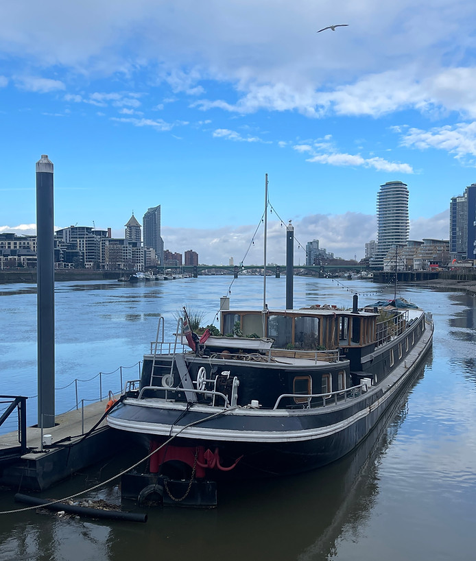 An amazing Dutch Barge Hotel on Thames in the day