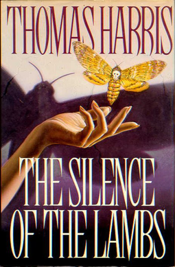 Book cover for The Silence of the Lambs by Thomas Harris, showing a yellow moth above an outstretched hand against a dark background.