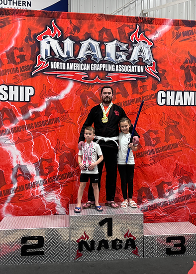 Martial artist stands on the podium after awards