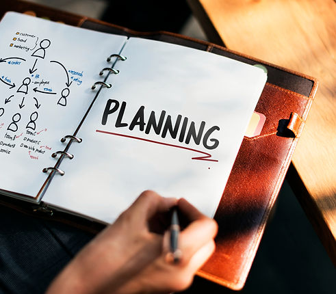 woman-writing-planning-business-strategy.jpeg