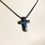 Thumbnail: Snowflake Obsidian Cross on Cotton Cord Unisex