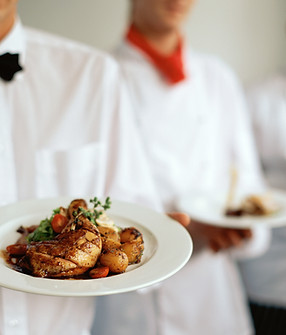 Waitstaff Holding Plates