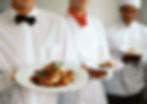 Waitstaff Holding Plates