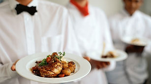 Waitstaff Holding Plates