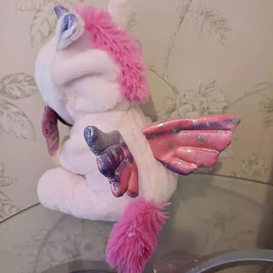 Adopt a plush - Cute pug wearing a unicorn outfit, very good condition